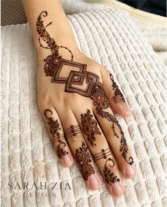 Tassel Inspired Pretty Back Hand Mehndi Design Tassel Inspired Pretty Back Hand Mehndi Design